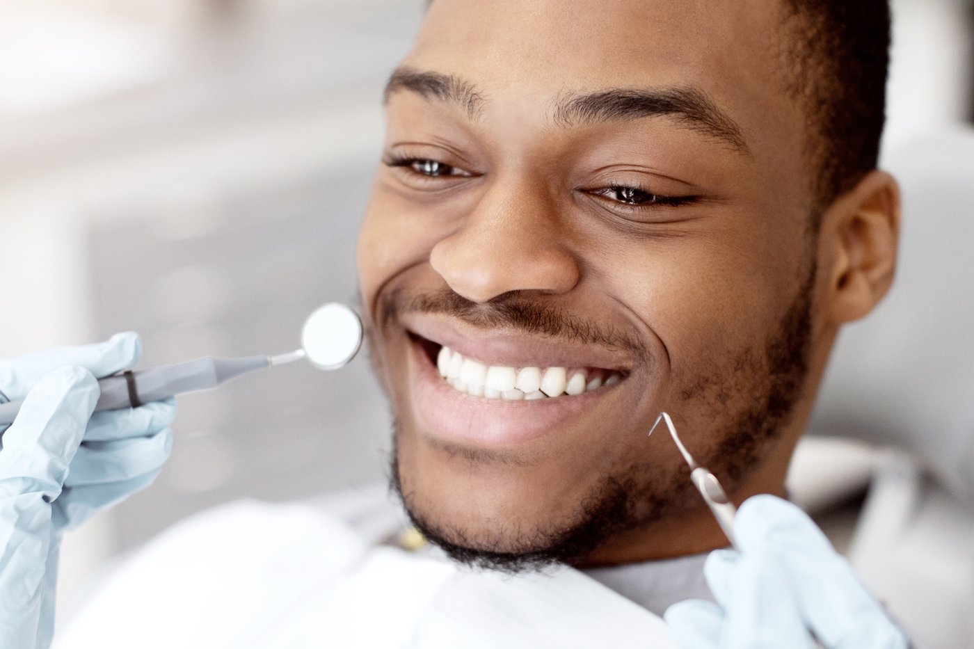 Patient smiling during a routine dental visit at Regency Dental Care in Palatine, IL